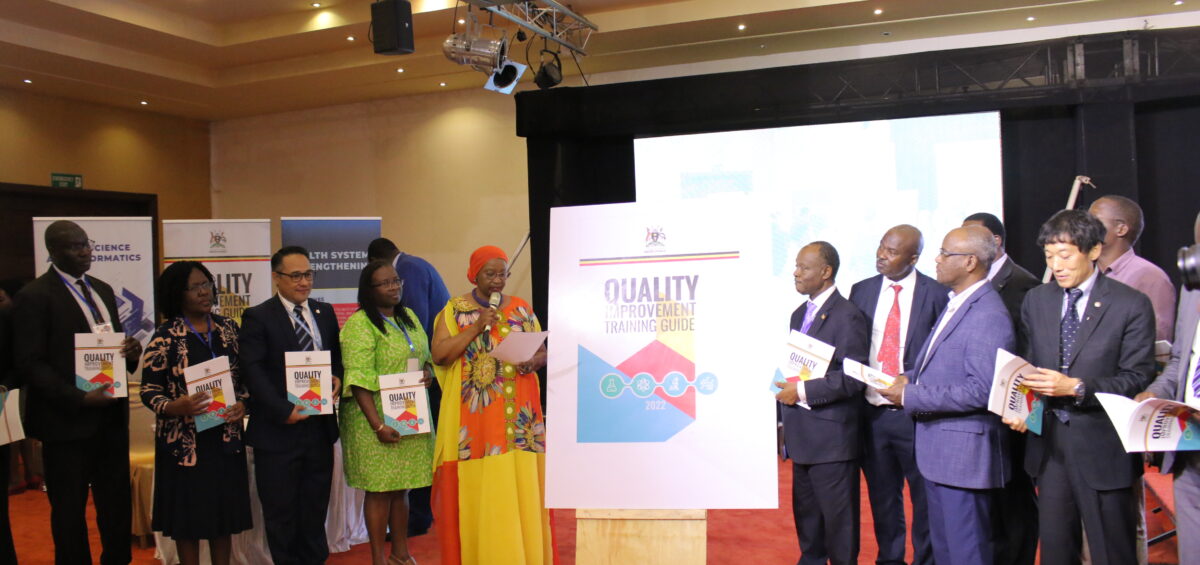 Hon. Hanifa Kawooya launching the online QI materials and training guide